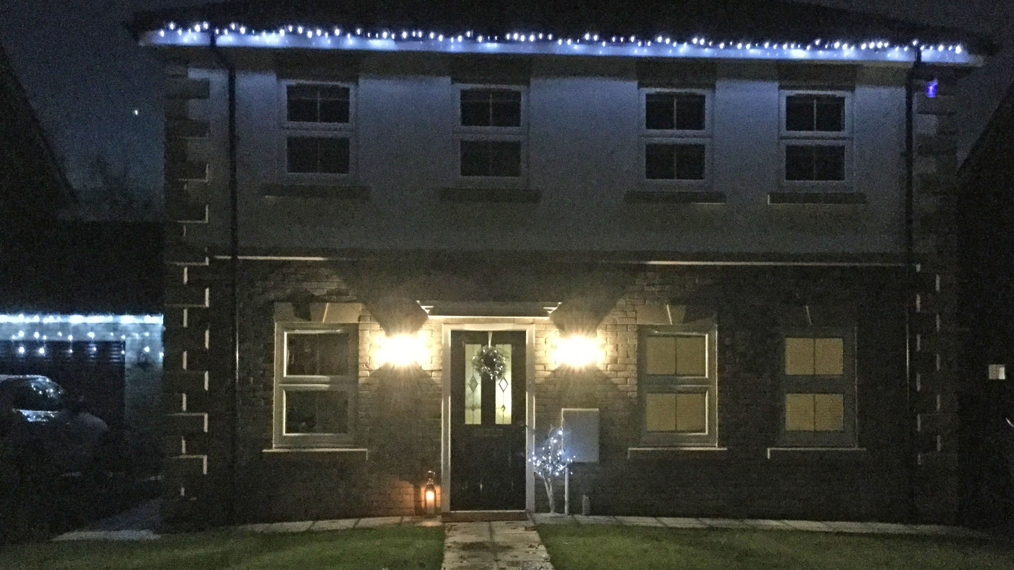 house decorated with Christmas lights 